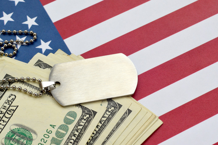 Cappella Pueblo West Senior Living Community in Pueblo West, CO - cappella of pueblo west details of flag dog tag and dollar bills