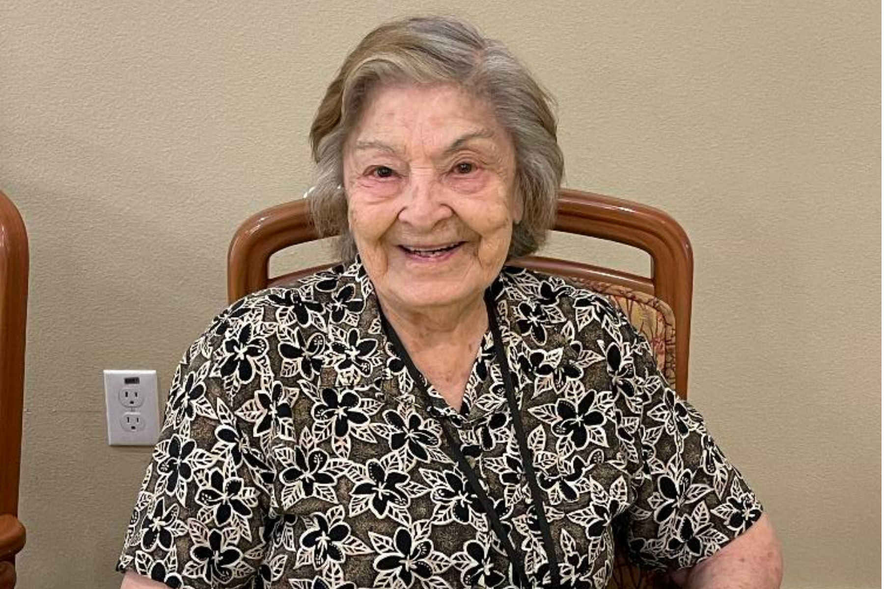 Cappella Pueblo West Senior Living Community in Pueblo West, CO - resident smiling landscape