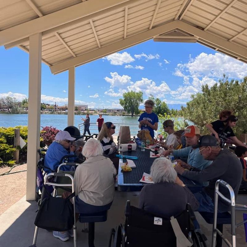 Cappella Pueblo West Senior Living Community in Pueblo West, CO - residents at the lake