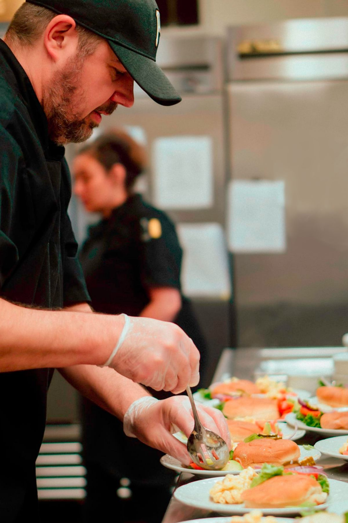 Cappella Pueblo West Senior Living Community in Pueblo West, CO - chef plating food