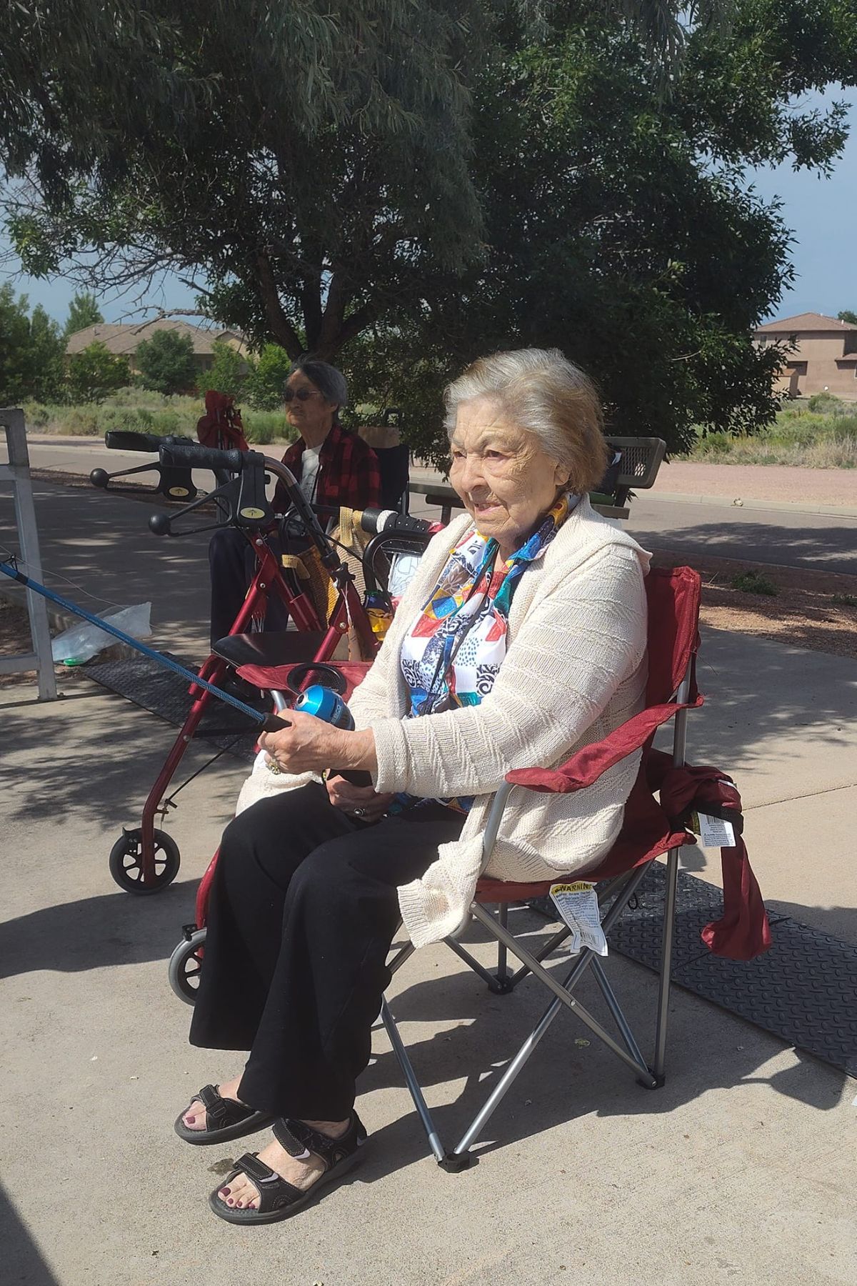 Cappella Pueblo West Senior Living Community in Pueblo West, CO - resident lady fishing