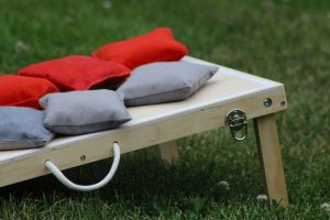 Cappella Pueblo West Senior Living Community in Pueblo West, CO - cornhole,game,in,the,grass