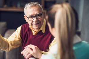 Cappella Pueblo West Senior Living Community in Pueblo West, CO - cappella of pueblo west senior man with cargiver