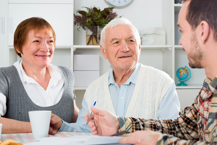 Cappella Pueblo West Senior Living Community in Pueblo West, CO - cappella of pueblo west adult child meeting with senior parents Cappella Pueblo West Senior Living Community in Pueblo West, CO - cappella of pueblo west adult child meeting with senior parents