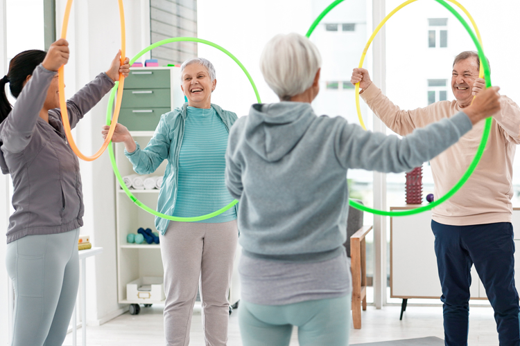 Cappella Pueblo West Senior Living Community in Pueblo West, CO - cappella of pueblo west group of seniors in an exercise class (1)