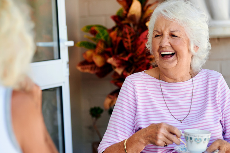 Cappella Pueblo West Senior Living Community in Pueblo West, CO - cappella of pueblo west senior women laughing and having tea