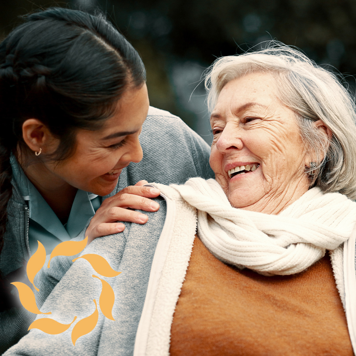 Cappella Pueblo West Senior Living Community in Pueblo West, CO - cappella of pueblo west senior woman with caregiver smiling