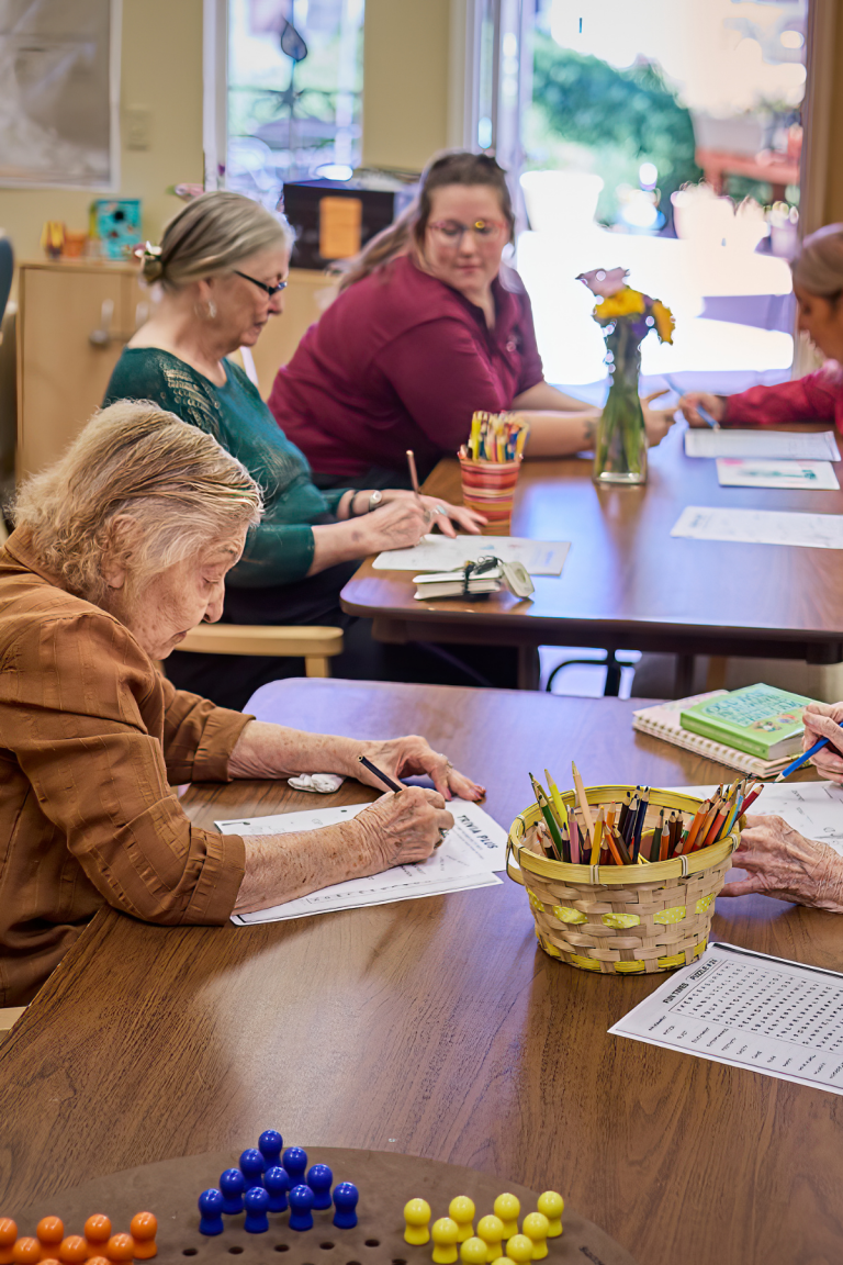 Cappella Pueblo West Senior Living Community in Pueblo West, CO - residents doing crafts