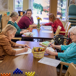 Cappella Pueblo West Senior Living Community in Pueblo West, CO - residents doing crafts square