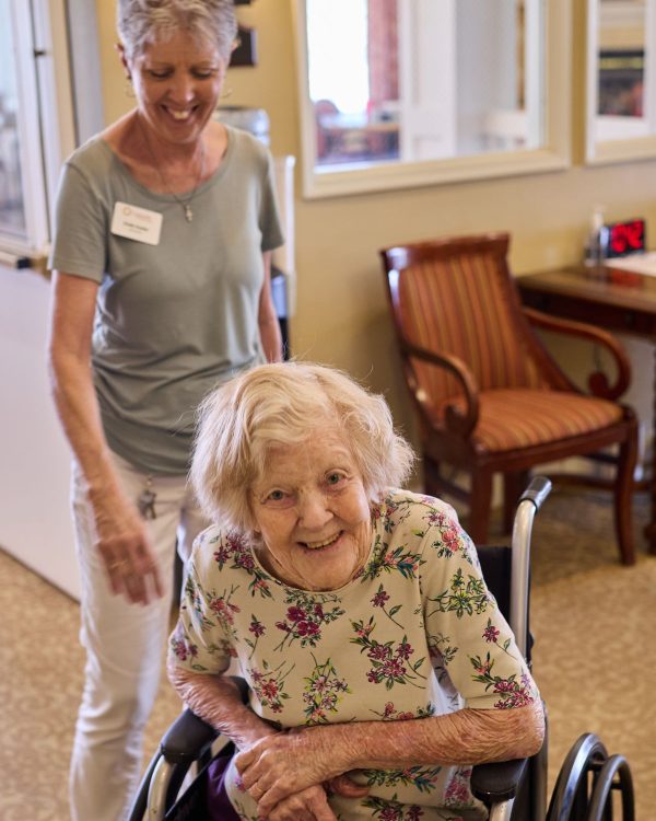 Cappella Pueblo West Senior Living Community in Pueblo West, CO - resident with staff